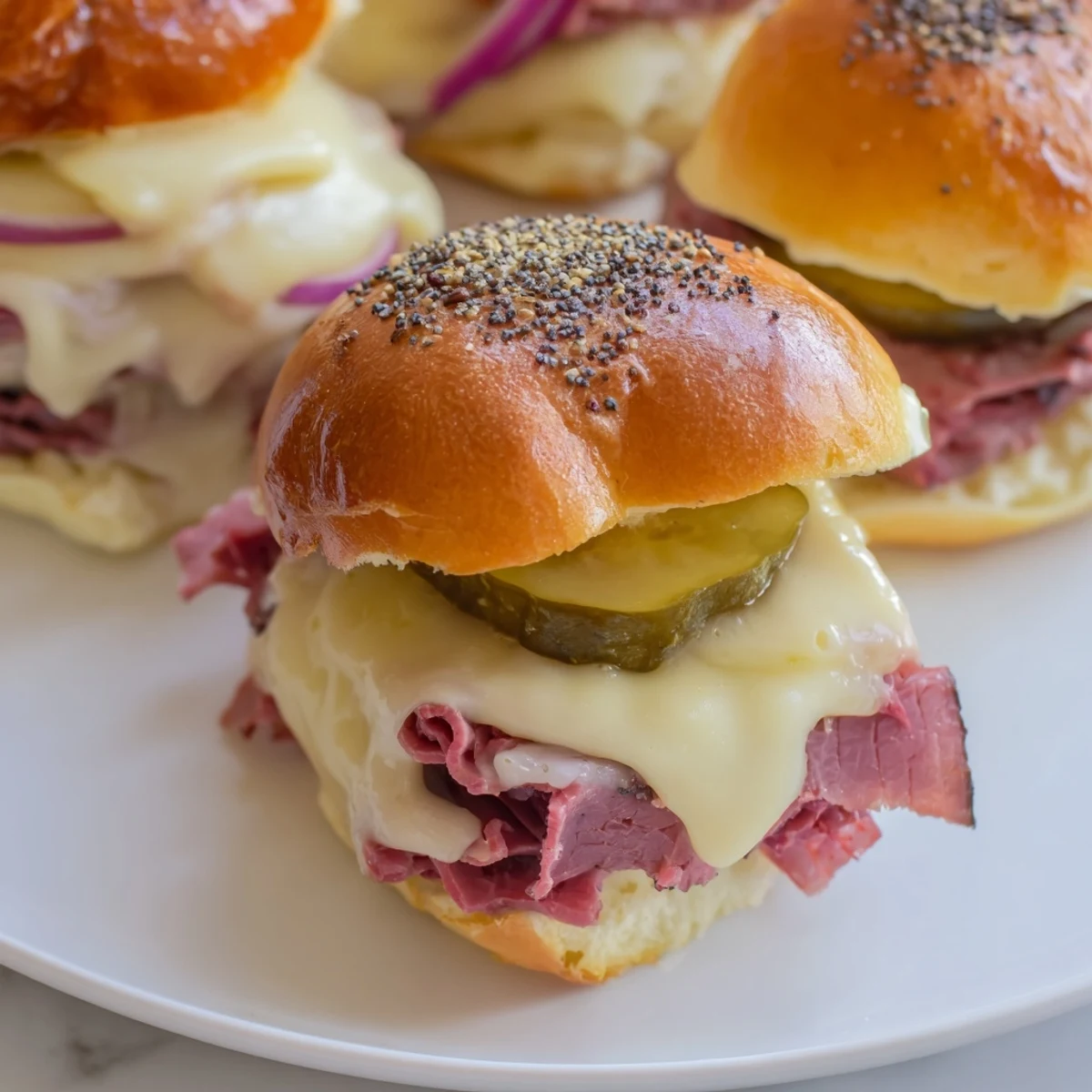 Golden Corned Beef Sliders with Cheese on a platter, featuring toasted brioche buns, melted Swiss, and tangy mustard for a party-ready appetizer.