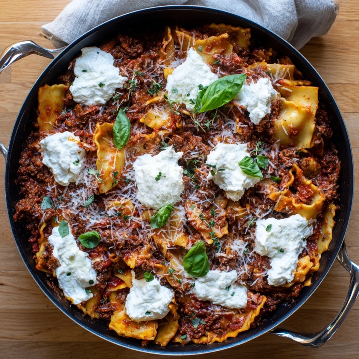 Golden Skillet Lasagna garnished with fresh basil, ready to serve with a side salad and garlic bread.