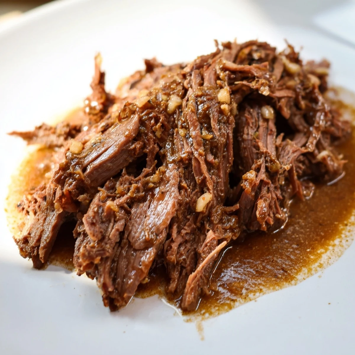 Slow Cooker Korean Beef Pot Roast With Soy Garlic Gravy over steamed rice with scallions.