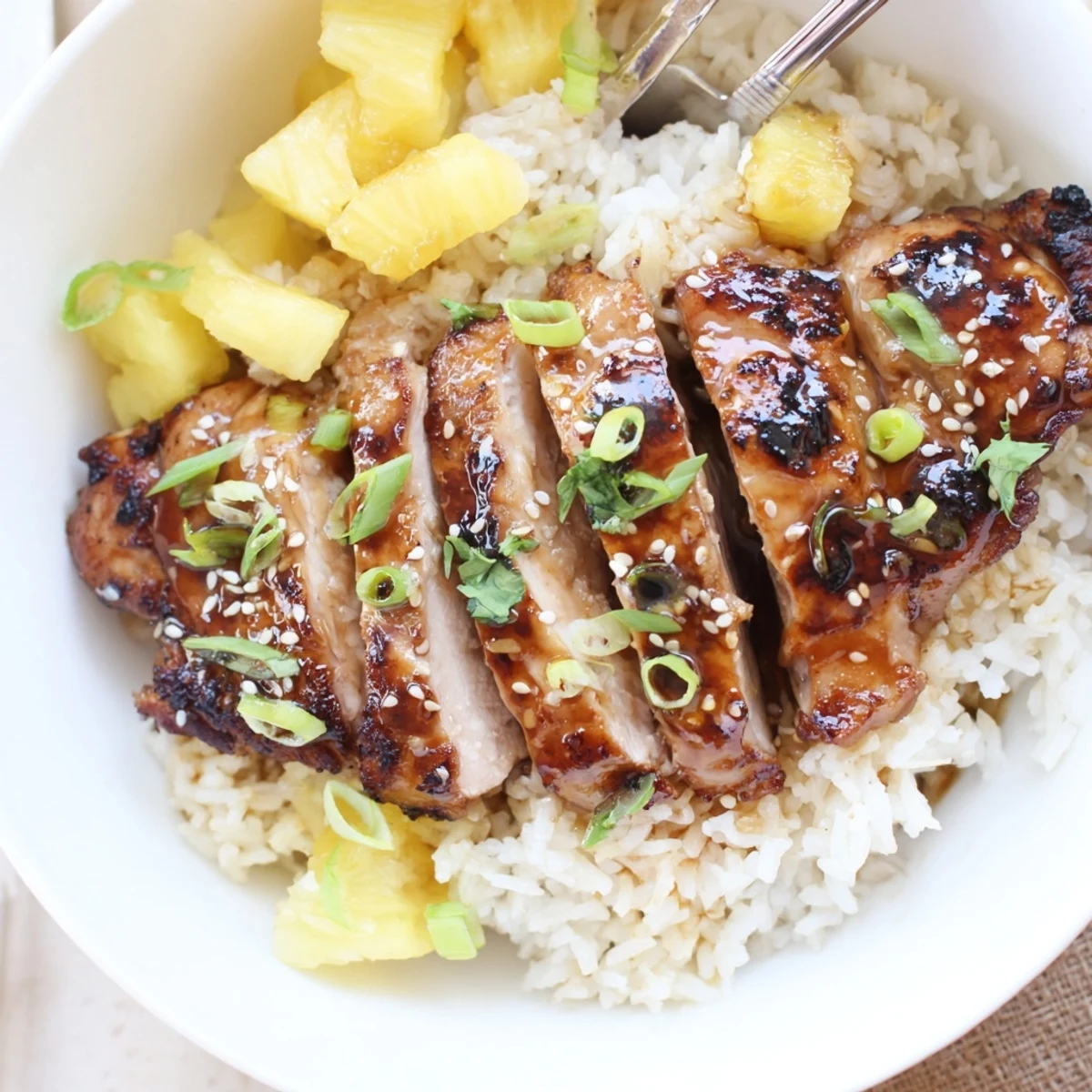 Hawaiian Chicken With Coconut Rice plated with caramelized chicken and fluffy jasmine rice